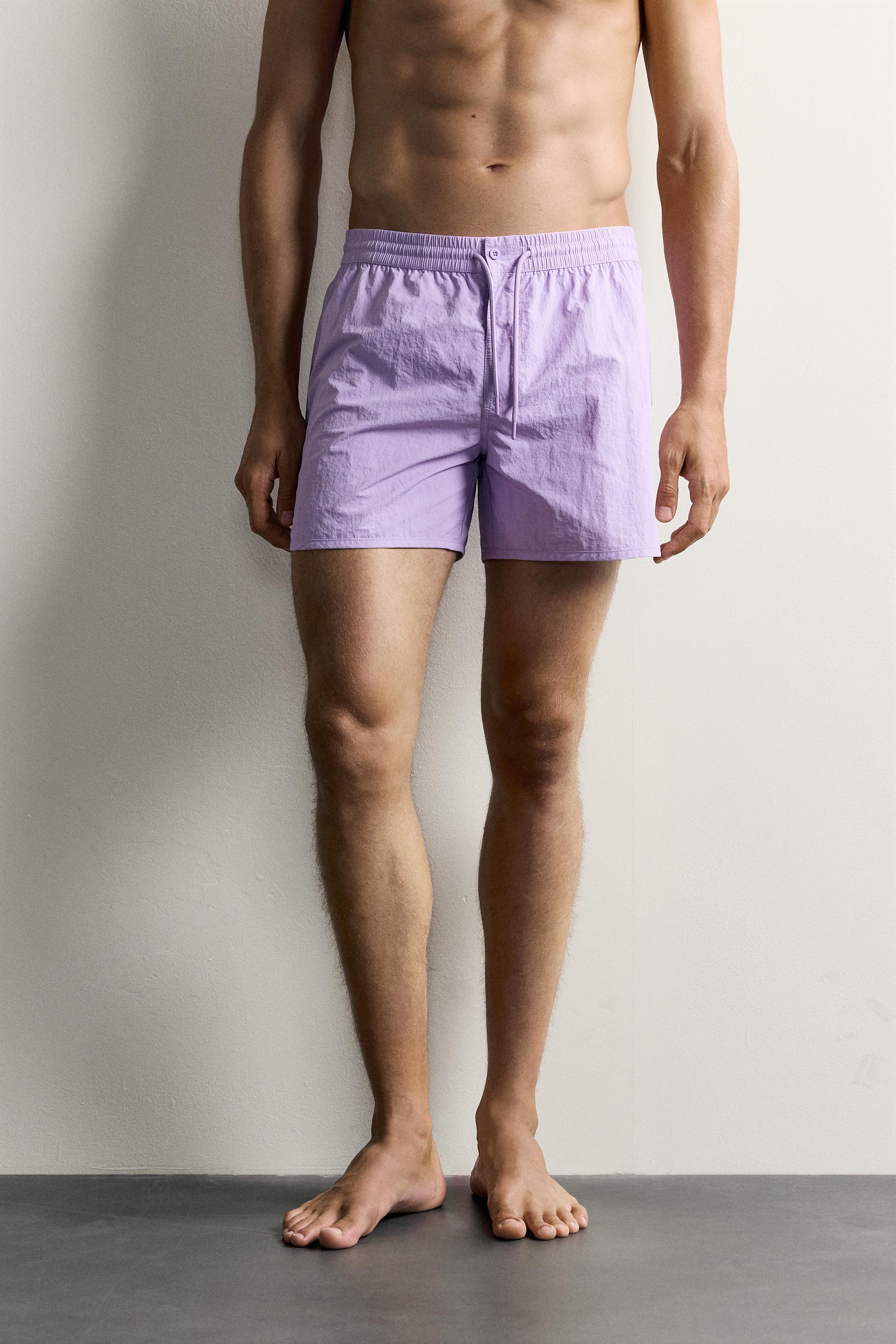 SHORT DE BAIN MI-LONG À FENTES